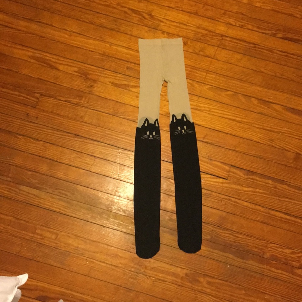 Tan tights with knee high black cats